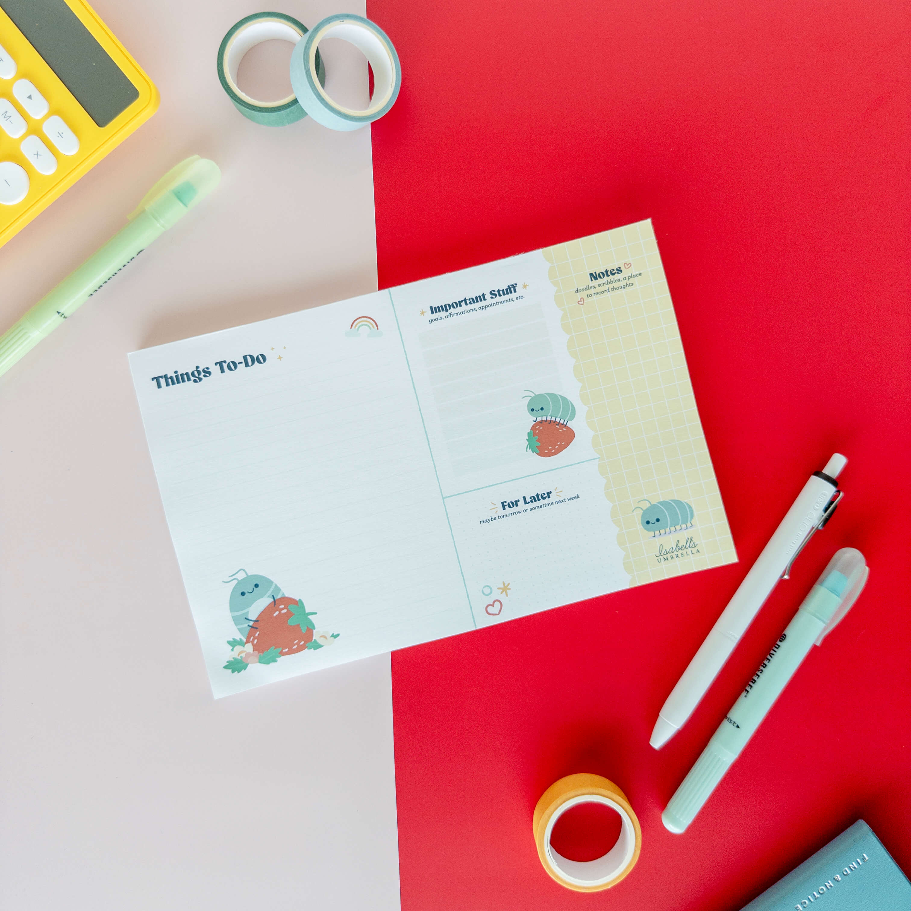 Cute roly poly planner pad with spaces for a to-do list and notes displayed with colorful stationery.