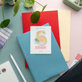 Cute Brontosaurus magnetic bookmark with matte lamination, kawaii dinosaur clip for books, journals, and planners.