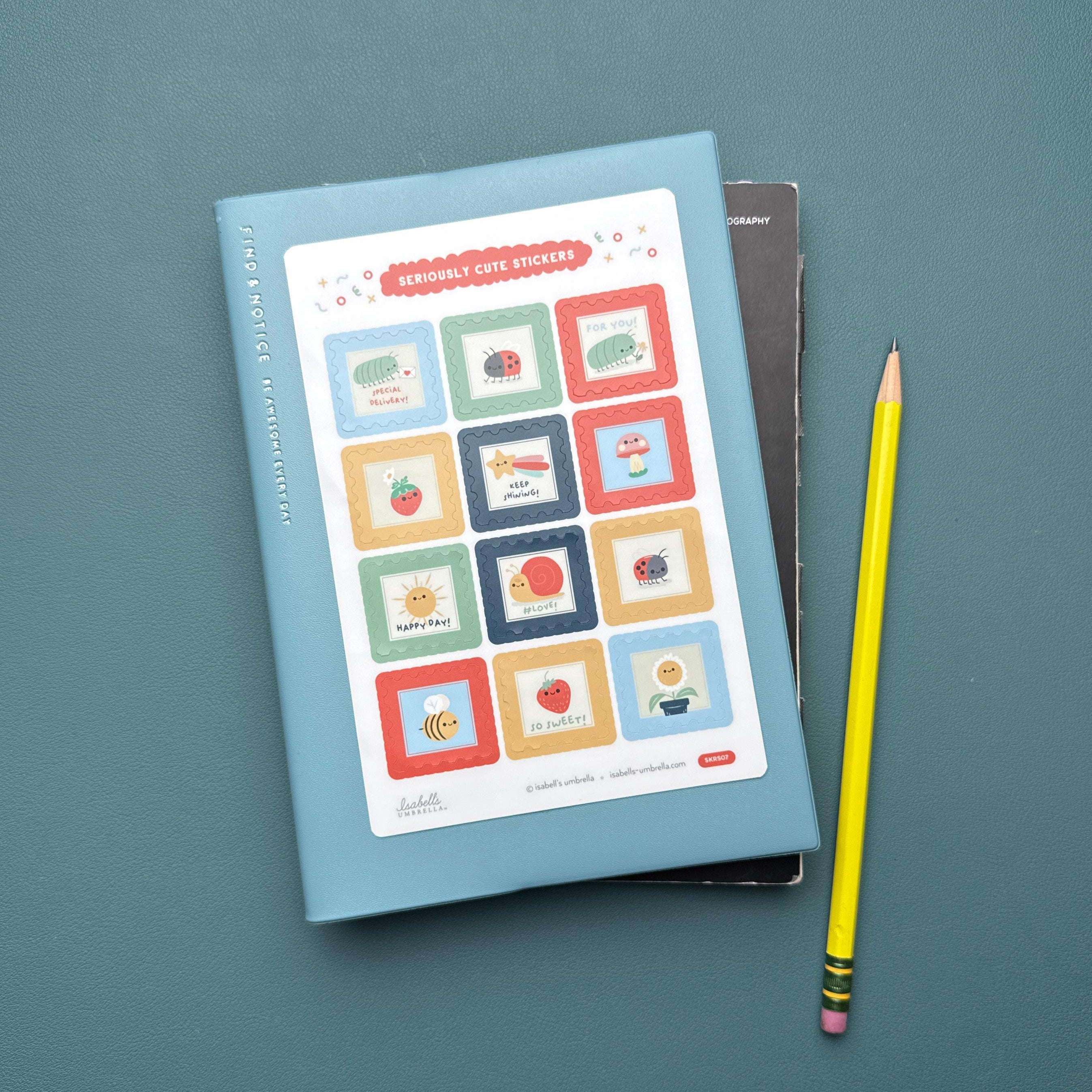 Sticker sheet of 12 different illustrations including roly-polies, ladybugs, strawberries, a snail, a bee, a mushroom, and a shooting star.