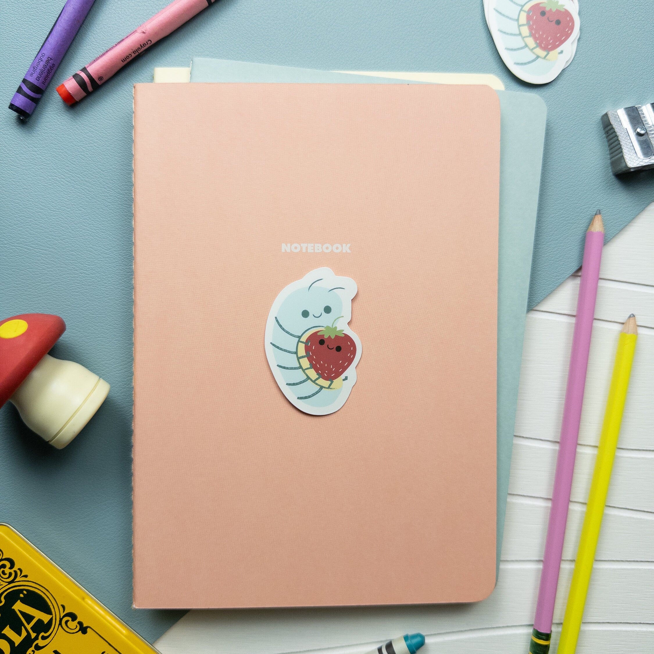 Cute roly poly and strawberry vinyl sticker, kawaii waterproof matte decal for laptops, water bottles, and journals.