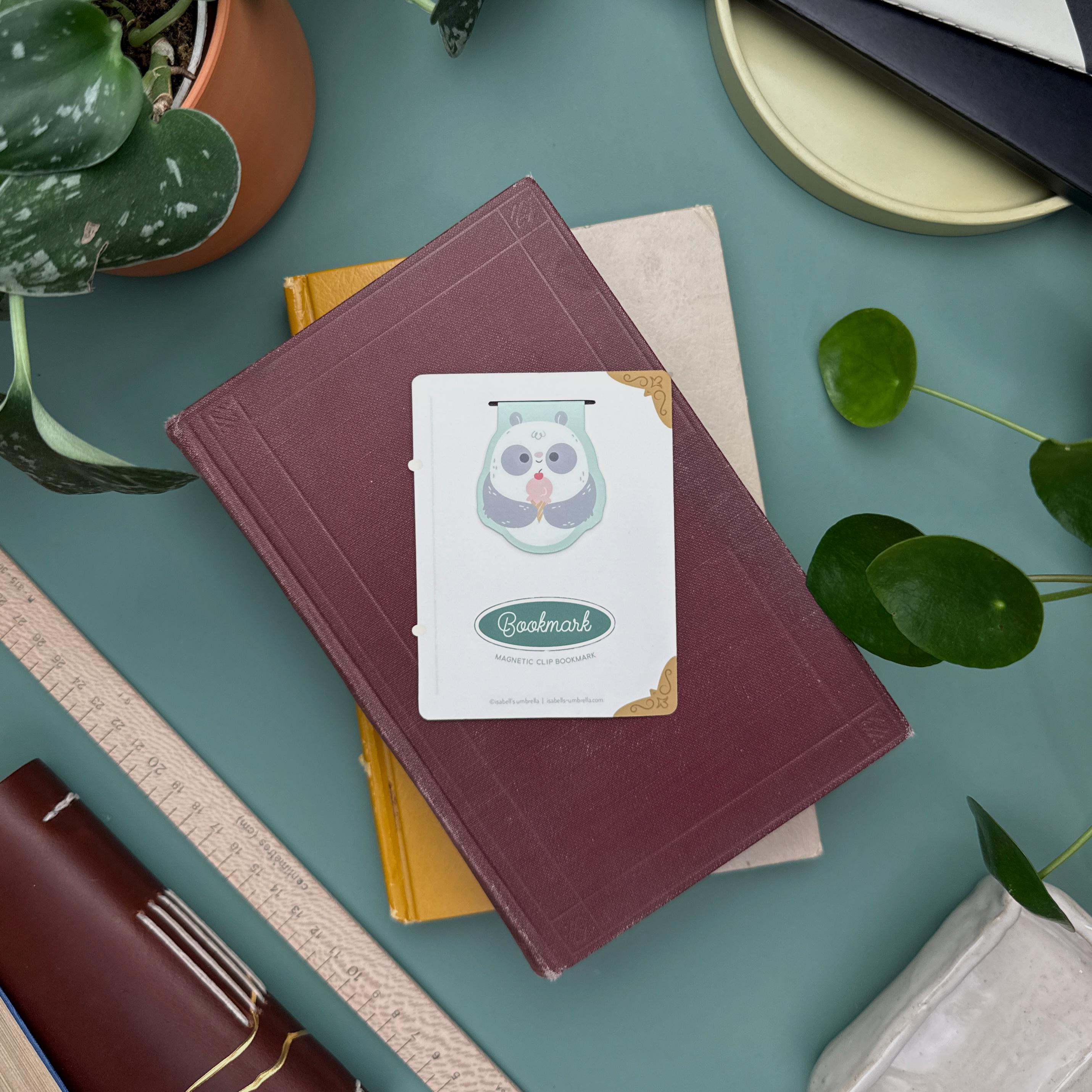 Cute panda eating ice cream magnetic bookmark, kawaii illustrated page marker with laminated finish for books, planners, and journals.