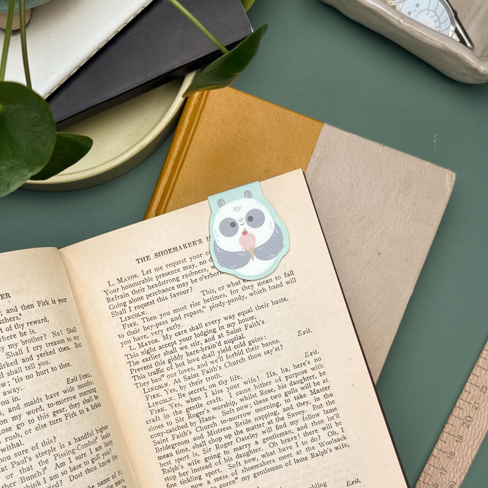 Cute panda eating ice cream magnetic bookmark, kawaii illustrated page marker with laminated finish for books, planners, and journals.