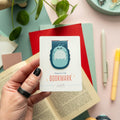 Cute Roly Poly bug magnetic bookmark with matte lamination, kawaii stationery gift for readers and book lovers.