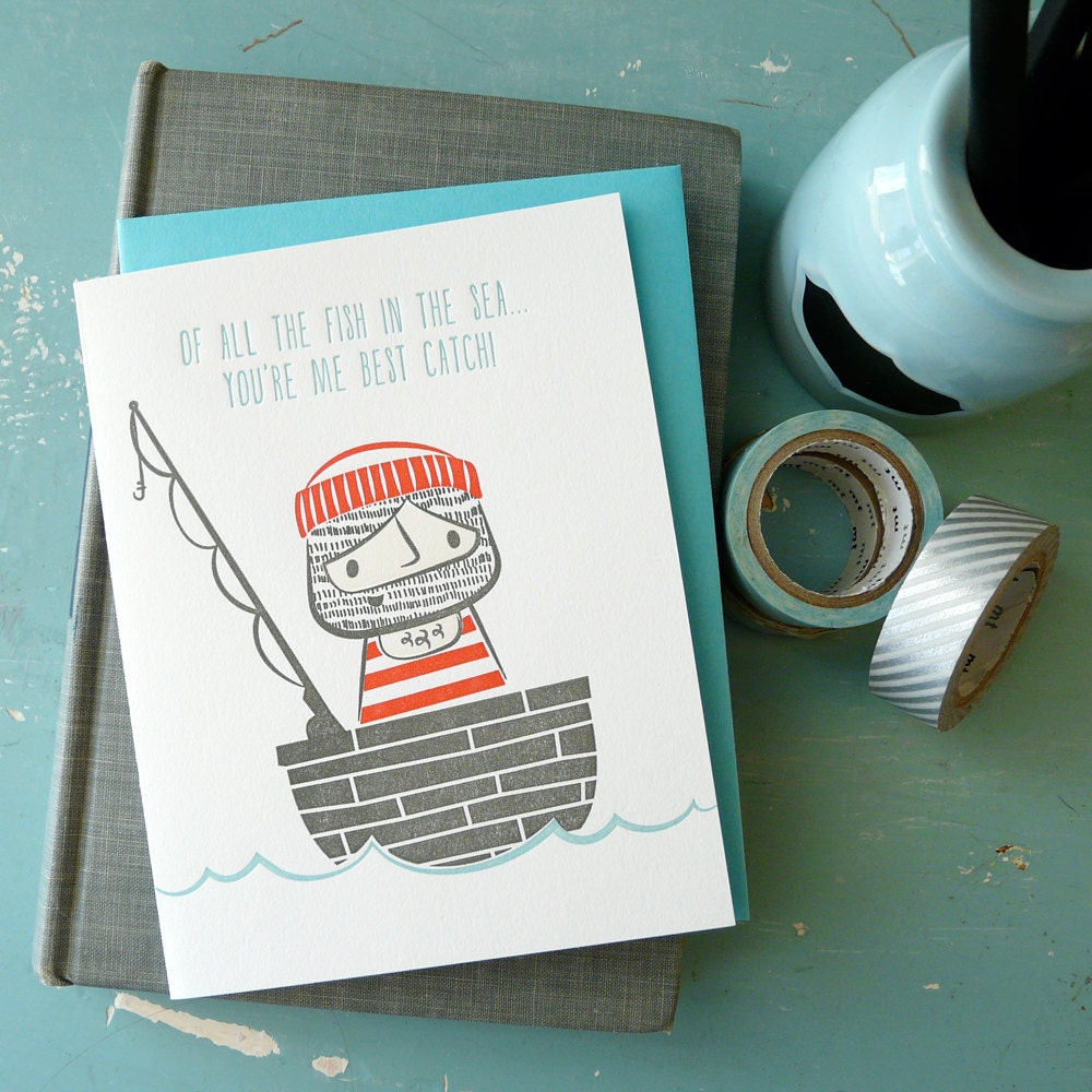 Sailor in a boat letterpress card with the phrase “Of all the fish in the sea, you’re me best catch,” cute nautical anniversary and friendship card.