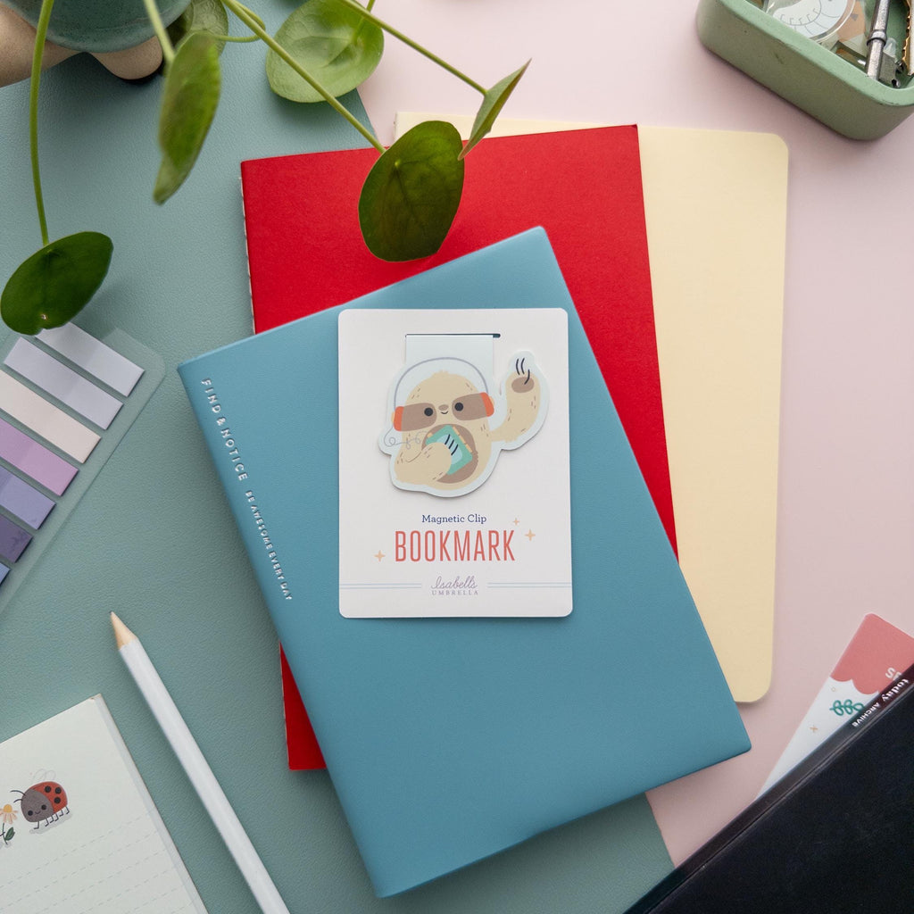 Sloth with Walkman magnetic bookmark displayed on branded backer card, matte finish, adorable music-themed gift for readers.