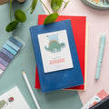 Cute Stegosaurus magnetic bookmark with matte lamination, kawaii dinosaur clip for books, journals, and planners.